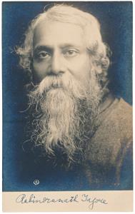 Autograph of Rabindranath Tagore on a real photo postcard with pre-printed postcard back. 
