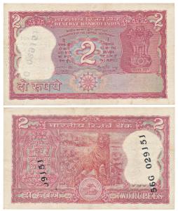 Rupees 2, signed Manmohan Singh, Error, no serial number on the front, instead the serial 