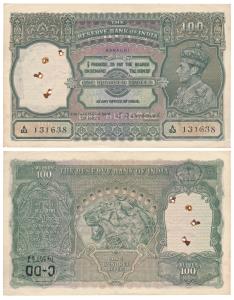 George VI, Rupees 100, 1938, Karachi, signed C. D. Deshmukh, (J&R 4.7.2F). Rusted holes in