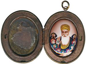 A metal locket containing a nice enamel portrait of Guru Nanak in the centre and the other