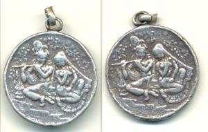 Silver Medal, 20.59g, obv. Krishna and Radha playing flute under a tree, rev. Godess Mahak
