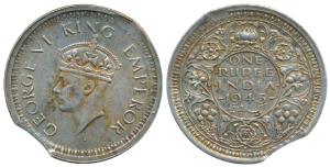 George VI, Half Silver Rupee, 1945, Bombay Mint, slightly clipped at the edge. Very Fine+.