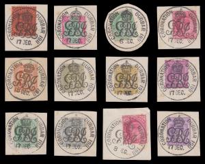 1911 KGV group of 12 stamps each pasted on separate piece of paper tied by "CORONATION DUR