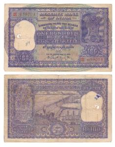 Rupees 100, 1960, signed P. C. Bhattacharya (J&R 6.7.4.2). Slightly torn at the top, Fine.