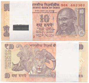 Rupees 10 bundle, 2015, signed Raghuram Rajan, Error a dark spot on the face of Mahatma Ga