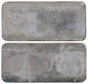 Silver Bar, Devkaran Nanjee, 20 Tolas, 233g, obv. the logo of the mint H. M. Mint Bombay w