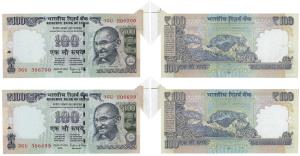 Rupees 100, 2014, signed Raghuram Rajan, Error, extra paper and an uneven cut in top right