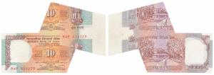 Rupees 10, signed C. Rangarajan, Error, margin with extra paper at right; the top note att