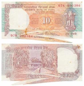 Rupees 10, signed C. Rangarajan, Error, miss-print due to crumpled paper, splitting the se