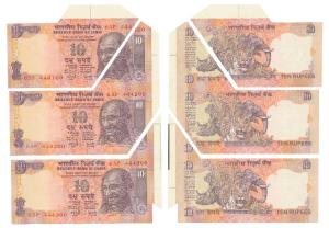 Rupees 10, signed Y. V. Reddy, Error, three consecutive miss-cut notes, all with extra pap
