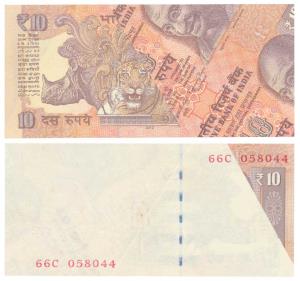 Rupees 10, signed Raghuram Rajan, Error, with a white patch on most of the note on the fro