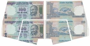 Rupees 100, signed Y. V. Reddy, Error, a pair of two consecutive miss-cut notes, with extr