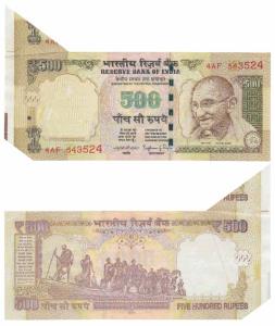 Rupees 500, signed Raghuram Rajan, Error, miss-cut extra paper of the previous note at top