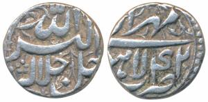 Akbar, Silver Rupee, 11.49g, Lahore Mint, Ilahi type, Month Mihir, Year 42 (KM 66.3). Abou