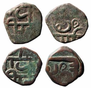 The symbol of ‘Shivling’ or ‘Shivpindi’ in a vertical position on the reverse between ‘Chh