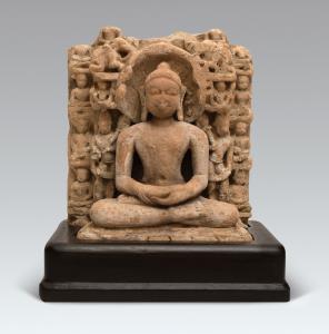 Seated in sattvasana on a lotus, under a multi-headed cobra canopy, his hands in dhyanasan