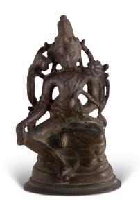 Seated in lalitasana on a lotus throne, a padma flowering at each shoulder, his right hand