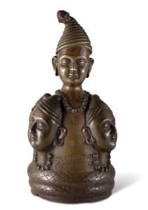 The lower tier comprising four turbaned heads pointing in the four cardinal directions, a 