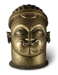 of columnar form with moustachioed face of Shiva, with wide staring eyes, ridged hair held