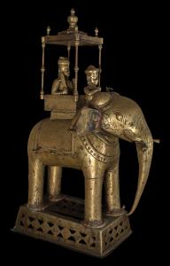 The Hindu deity accompanied by his consort, Mhalsa, seated in a howdah, with mahout in fro