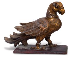 On rectangular base, with painted details,<br/>The parakeet is commonly associated with lo