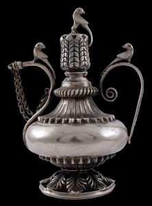 Baluster shape with narrow neck and screw stopper surmounted by a domed, petalled lid with