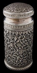 Profusely chased and decorated with floral scrolls, the pierced cover depicting a composit