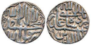 Akbar (AH 963-1014; 1556-1605 AD), Silver Rupee, 11.37g, mint off flan stylization that of