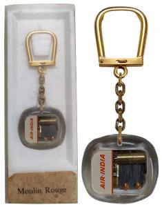 Moulin Rouge Air India musical Swiss winding key chain.