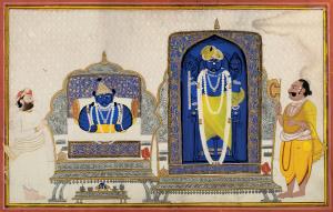The images of Mathuradhishji and Lalan (Balkrishna) flanked by a priest, likely Gosain ji 