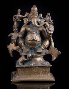 The four-armed elephant headed deity seated on a lotus throne, on raised square base, his 