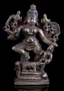 The eight-armed goddess on lotus base, wielding various weapons as well as ch akra and con