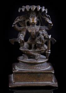 The bow Narasimha holds in his upper left hand is a characteristic feature of the Andhra r
