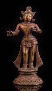 Standing on a circular inverted lotus base, his right hand hold , wearing beaded jewellery