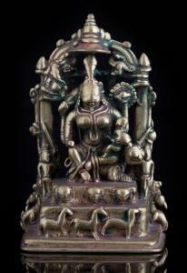 The goddess Ambika here displays the two contrasting aspects of her being: the nurturing d