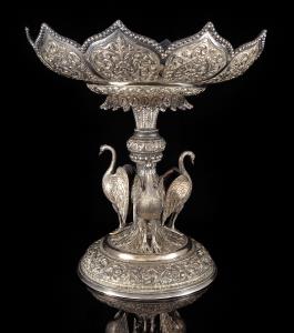 For a near-identical centrepiece by Oomersi Mawji, with only minor differences in the deco