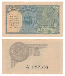 George V, Rupee 1, 2nd issue, 1935, signed J. W. Kelly, Prefix E, (J&R 3.2.1A). Minor tear