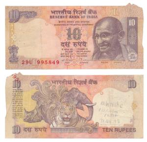 Rupees 10, signed C. Rangarajan, Error, paper fold while printing ensured that the top rig