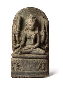 The eight armed goddess seated on a double lotus throne on raised pedestal supported by a 