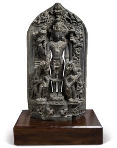 The four armed, broad shouldered Vishnu, stands holding conch shell and discuss in his low