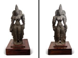 Both standing in tribhanga, holding a lotus in one hand, with tall tiered headdress flarin