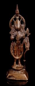 Standing on a lotus base on raised tapered plinth, holding the long stem of a padma in his