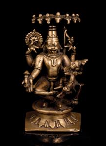 The four-armed, lion-headed avatar of Vishnu seated with legs loosely crossed and bound wi