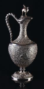 On flared foot, the hinged lid with finial in the form of a camel and rider, opening to re