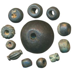 Copper Beads, (12) of various sizes and shapes. Some may form part of a necklace. From anc
