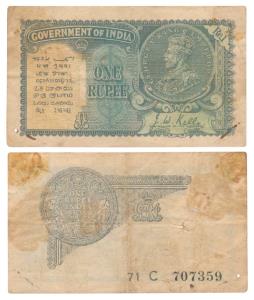 George V, Rupee 1, 2nd issue, 1935, signed J. W. Kelly, Prefix C, (J&R 3.2.1C). Fine+.