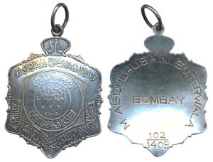 Dawoodi Bohra, Silver Medal, 20.25g, obv. Kalima, Sadiq Ahmed Khan surmounted by scales an
