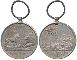 Burma Medal, Silver, obv. Burmese Elephant symbolically kneeling in submission before the 