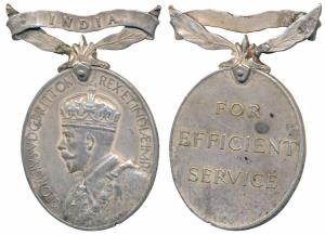 Efficiency Medal, George V, Silver, India written on a foliated bar, rev. For Efficient Se