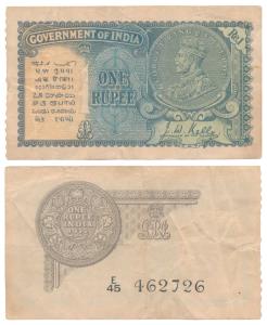 George V, Rupee 1, 2nd issue, 1935, signed J. W. Kelly, Prefix E, (J&R 3.2.1A). Fine+.